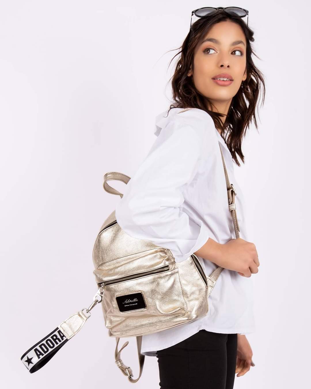 Olivia — gold leather backpack